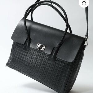 Sophisticated Black Satchel with Textured Design